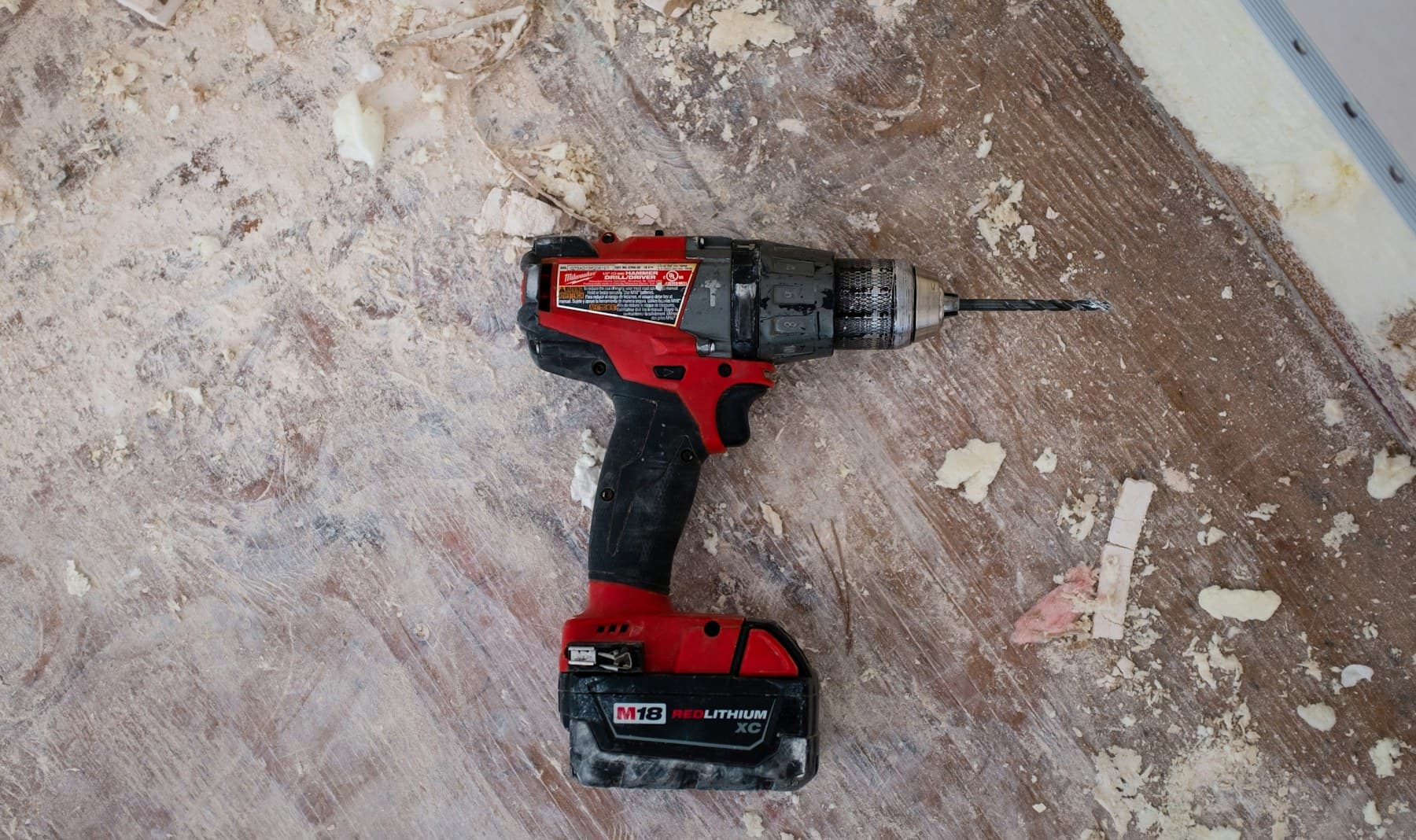 Tradesperson reviewing installation work with professional tools